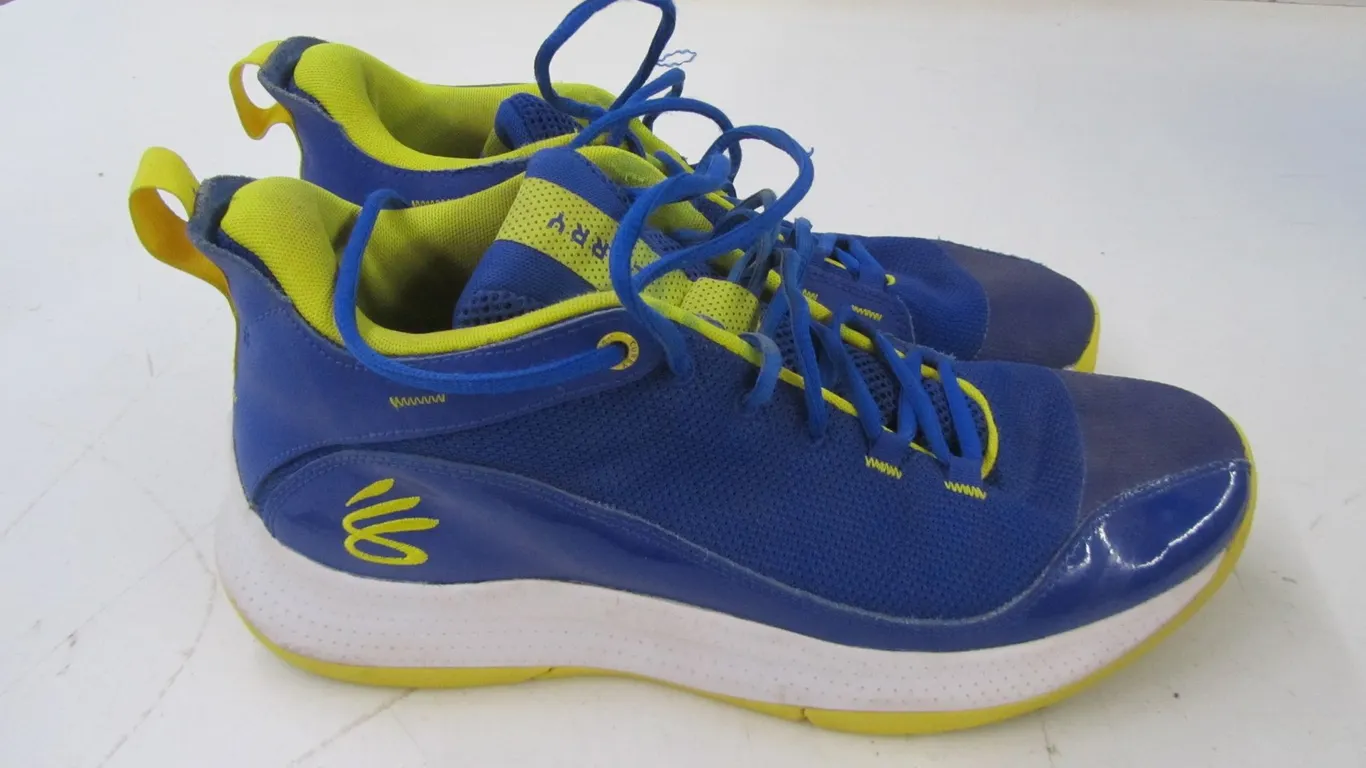 Pair Of Under Armour Curry Shoes
