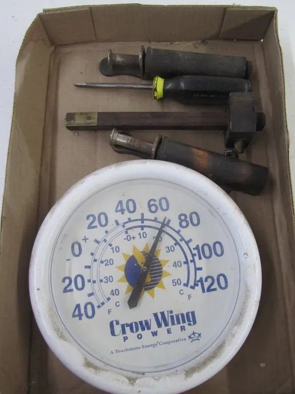 (2) Antique Spring-Loaded Plunger Door Stops, Flathead Screwdriver, Crow Wing Power Clock, And More
