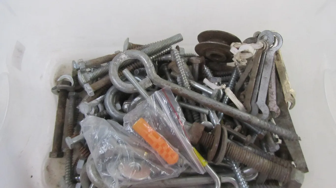 Sterilite Tote Full Of Assorted Hardware