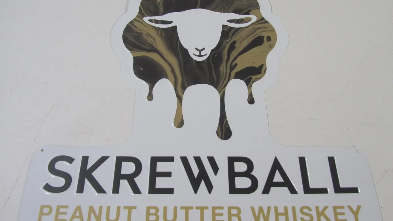 Metal Embossed Skrewball Peanut Butter Whiskey Sign