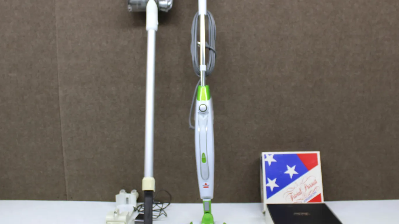 Dyson DC56 Vacuum, Bissell 1940 Mop, Curtain Rods