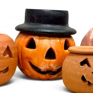 Vintage Terracotta and Painted Ceramic Pumpkin Decor with Jack-O’-Lantern Faces