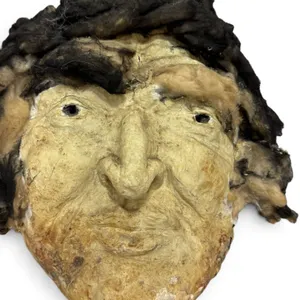 Handcrafted Mask With Hair and Embedded Components