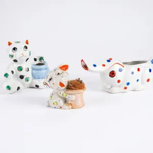 A Grouping of Three Vintage Ceramic Polka-Dot Figurines.  A Pitcher, Toothpick Holder & A Pin Cushio