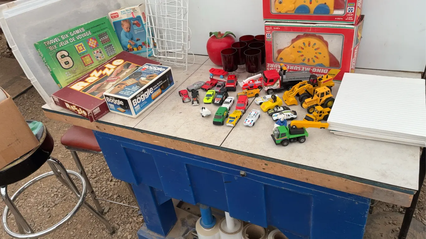 Quantity of miniature toys, several board games, writing pads, wire boot rack, ruby red glasses,