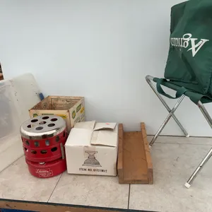 Coleman camp stove, ceiling light fixture, mitre box, insulated bag on stand in tote