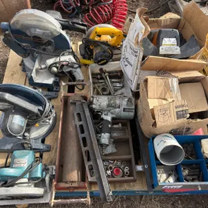 Collection of Tools Including Saws