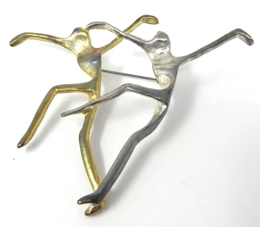 MODERNIST DANCING FIGURES TWO-TONE BROOCH