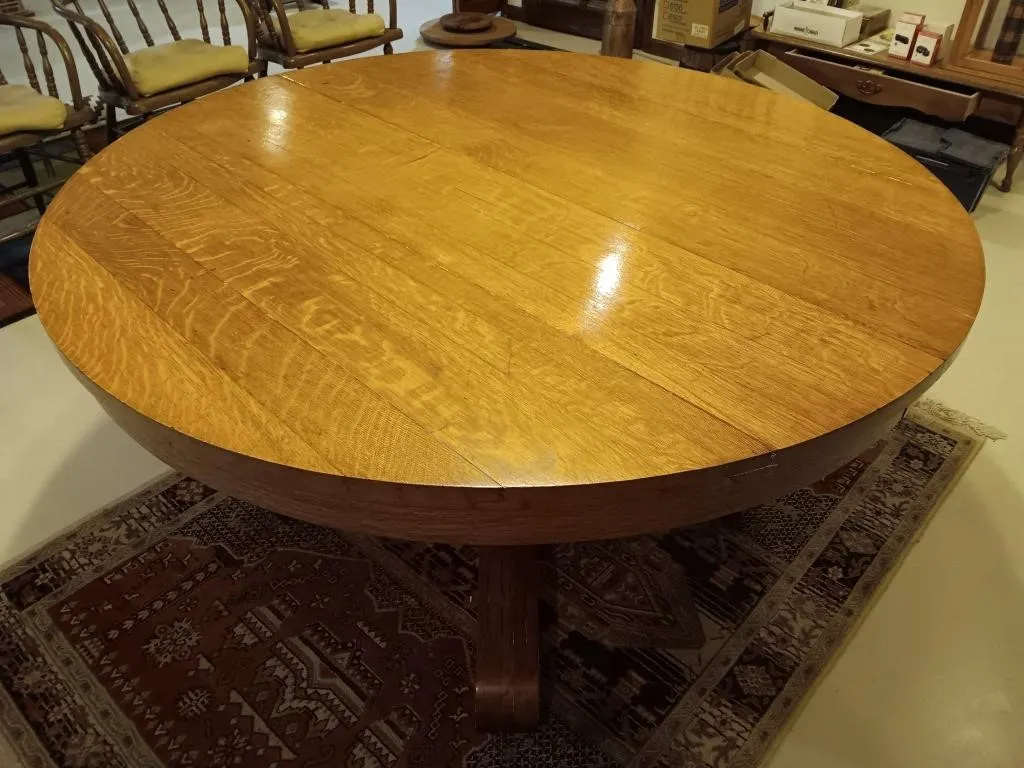 Round wood table and four chairs.