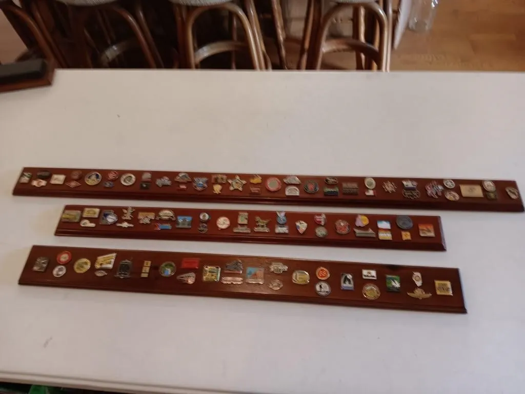 Destination Pins Mounted On Wood.