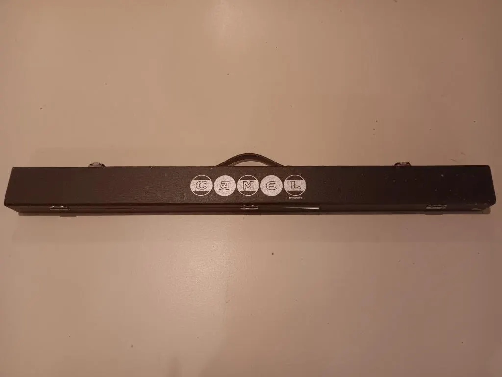 Camel pool cue new in case.