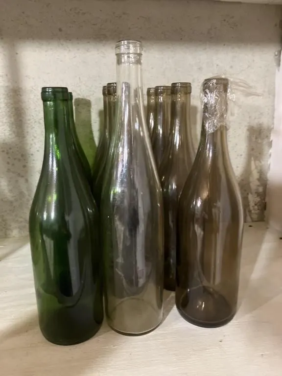 Twelve wine bottles
