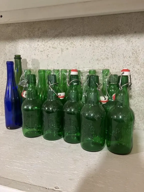 Nineteen glass bottles