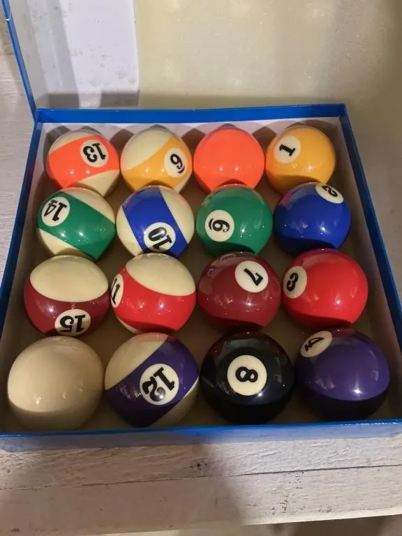 Pool balls
Look new in box