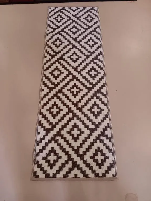 Indoor outdoor woven runner.
