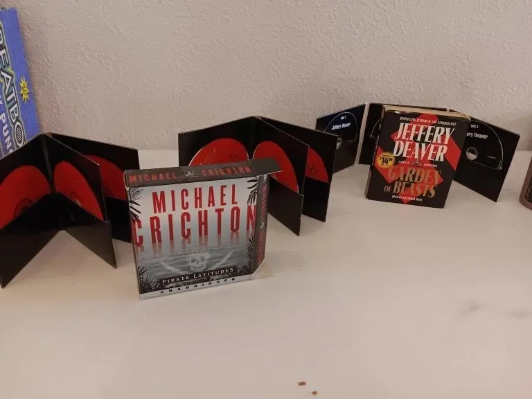 Michael Crichton novel, Jeffery Deaver novel.