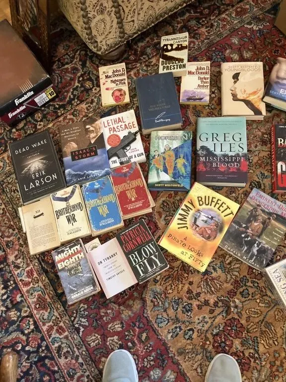 Variety of books, WEB Grffin, Erik Larson, Scott
