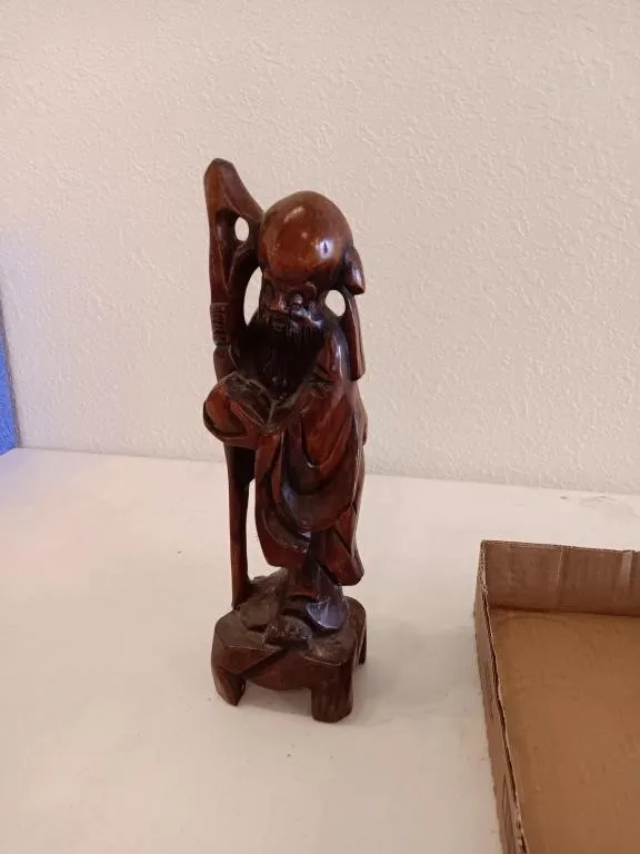 Vintage hand carved Chinese wooden statue. Shou