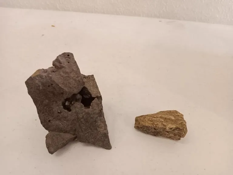 Herkimer diamond crystal nestled inside dolomite
