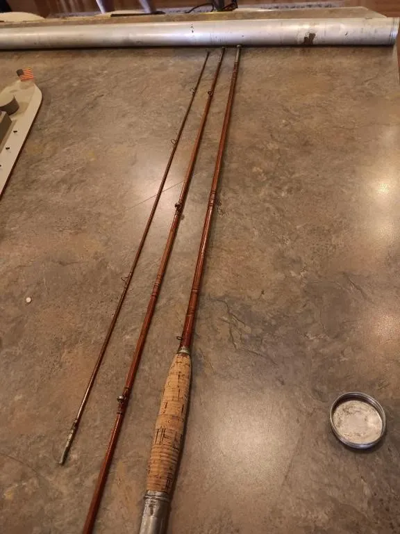 Bamboo Fly fishing rod with aluminum case.