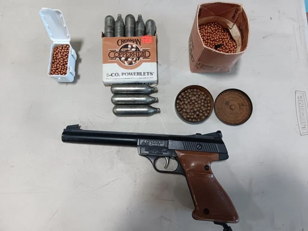 Crosman air gun with ammo and accessories.
Co2