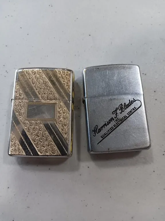 Two vintage zippo lighters