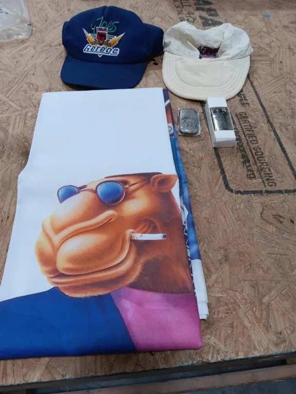 Two Camel lighters, 2 Camel hats, 6 foot x 6 foot