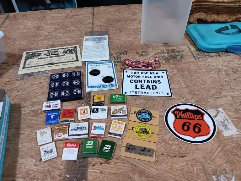 Assortment of items. Matches, emblems,