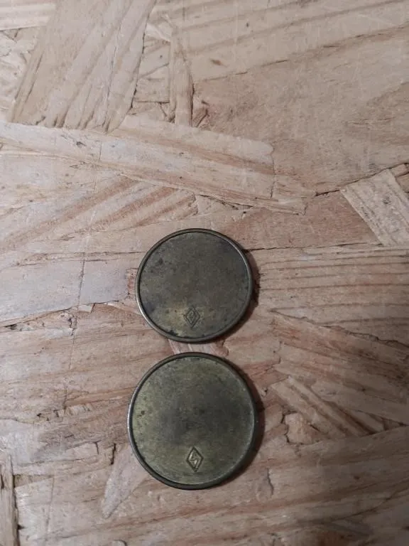 Vietnam War era gold tone military trade tokens