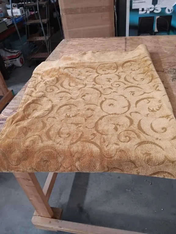 Appears to be a jacquard woven damask/scroll