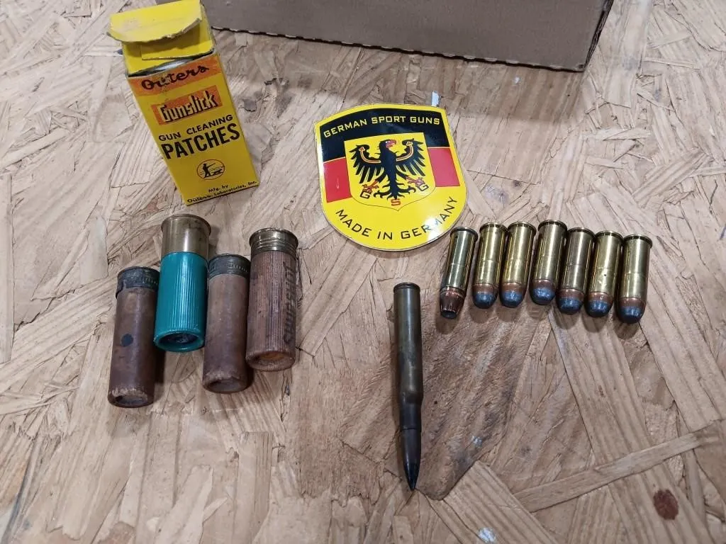 Vintage shotgun shells, gun cleaning patches,