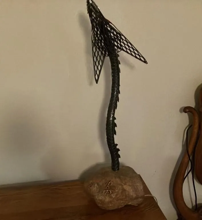 Metal Serpent Sculpture on Stone Base