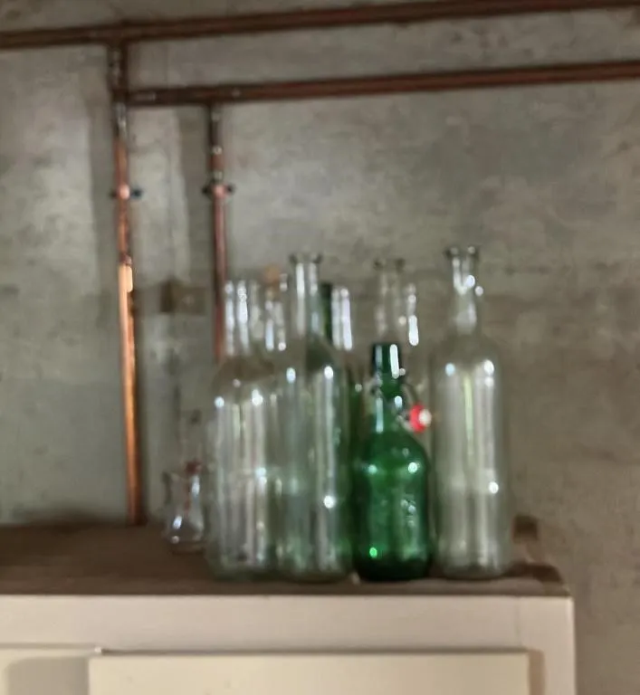 Collection of Assorted Glass Bottles