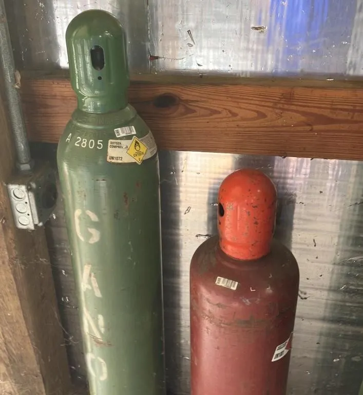 Two Compressed Gas Cylinders