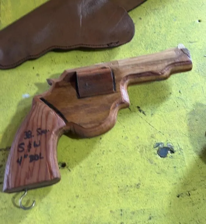 Collection of Four Hand-Carved Wooden Gun Models