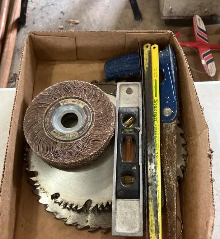 Assorted Tool Lot: Saws, Level, and Abrasive Wheel