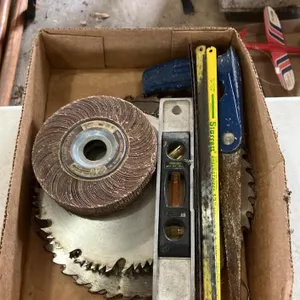 Assorted Tool Lot: Saws, Level, and Abrasive Wheel