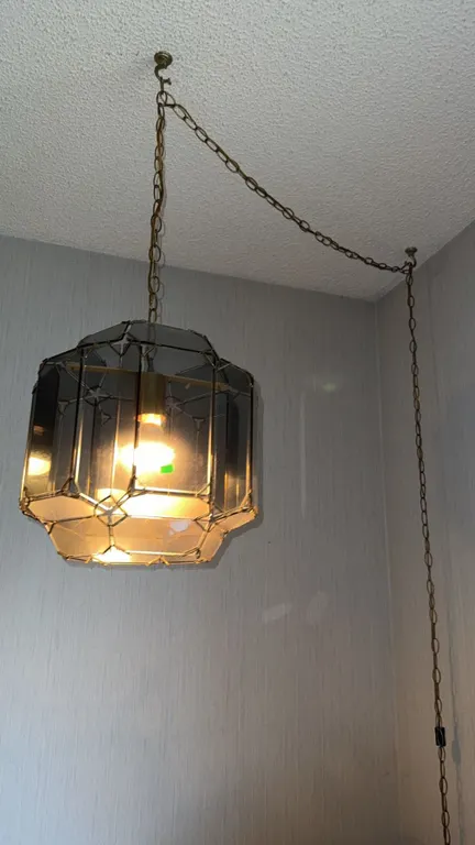 Hanging Swag Lamp with Brass Tone Frame and Tinted Glass Panels