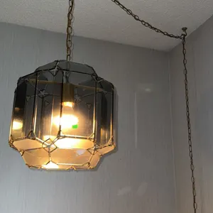 Hanging Swag Lamp with Brass Tone Frame and Tinted Glass Panels