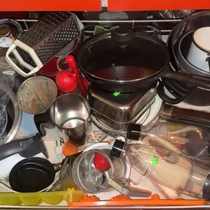 Kitchenware and Bakeware Lot Including Pots, Pans, Utensils, and Bake Moulds