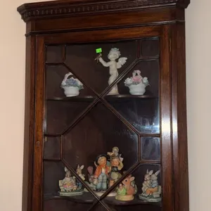 Wall Mounted Wood Display Cabinet with Assorted Ceramic and Porcelain Figurines