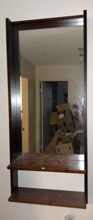Wall Mirror with Dark Wood Frame and Two Shelves