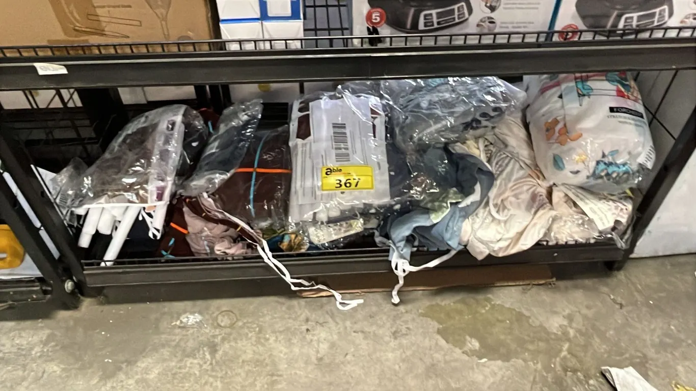 SHELF OF ASSORT SOFA COVERS