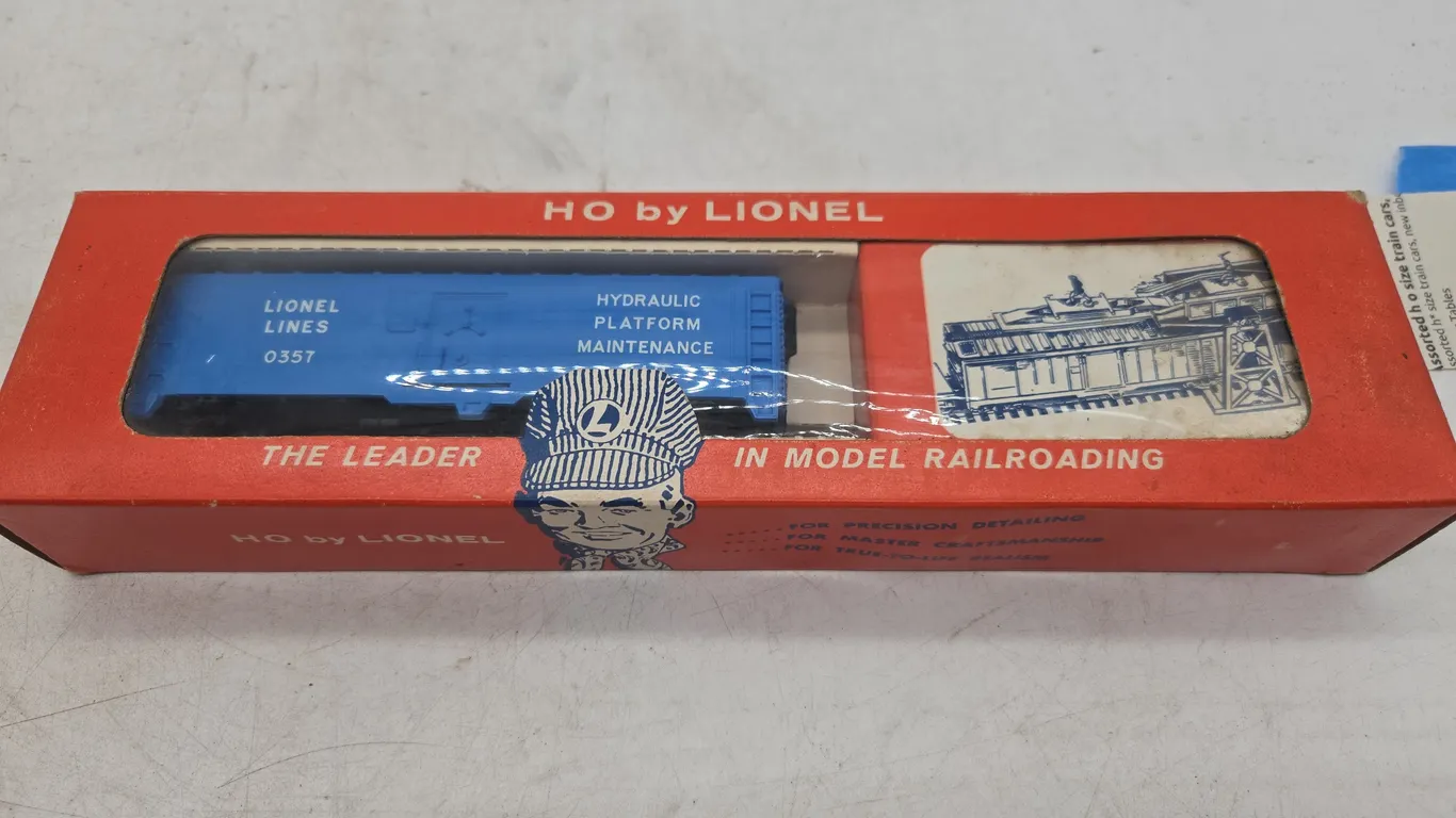 Vintage Lionel HO scale number 0357 cop and hobo car new in original box