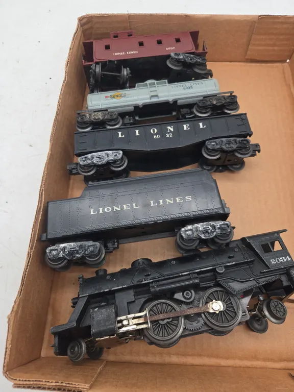 Vintage five piece Lionel train set with number 2034 locomotive