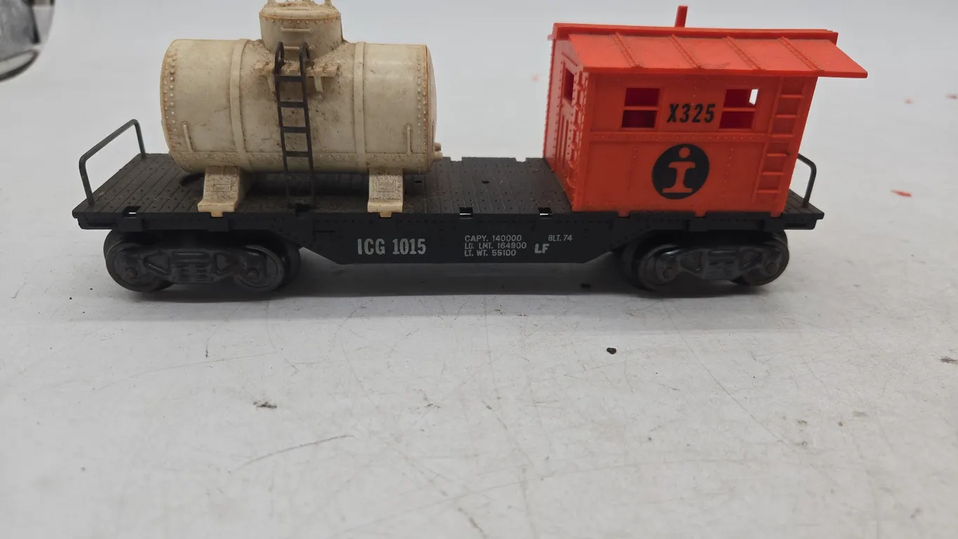 Vintage marxs brand work caboose with tank flat car
