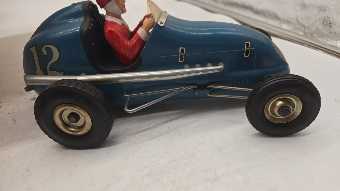 Vintage blue royal Cox thimble Drome champion, tether, car.