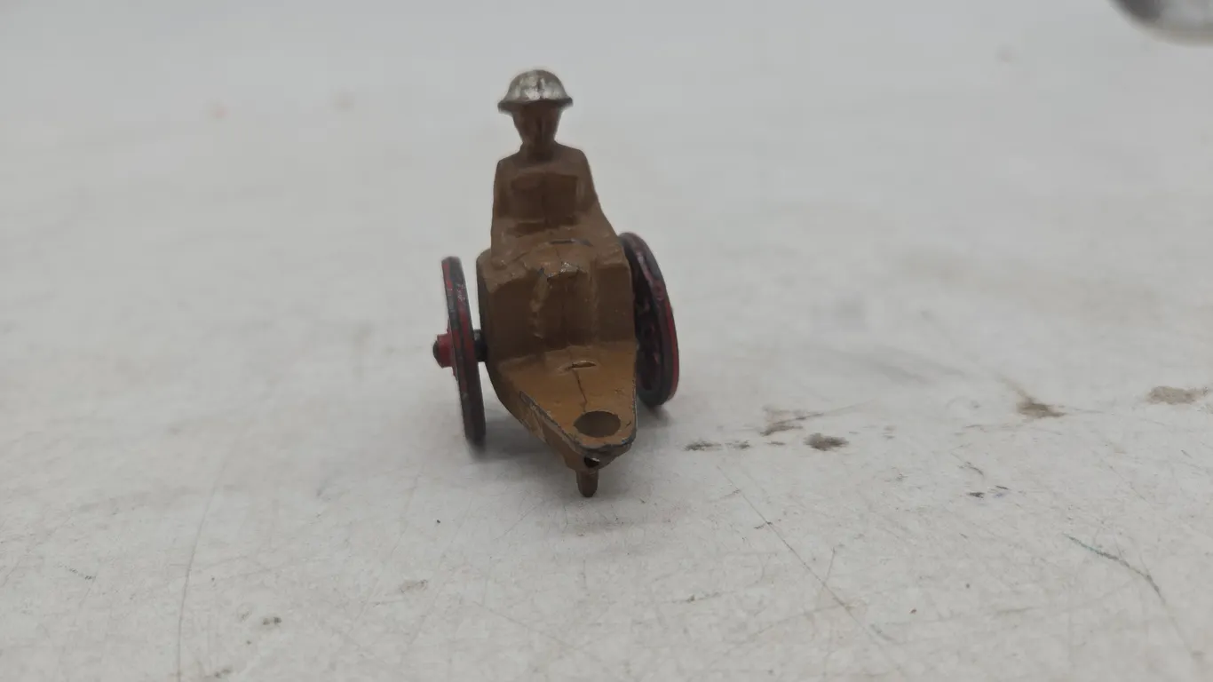 Vintage manoil lead toy soldier on ammo kart