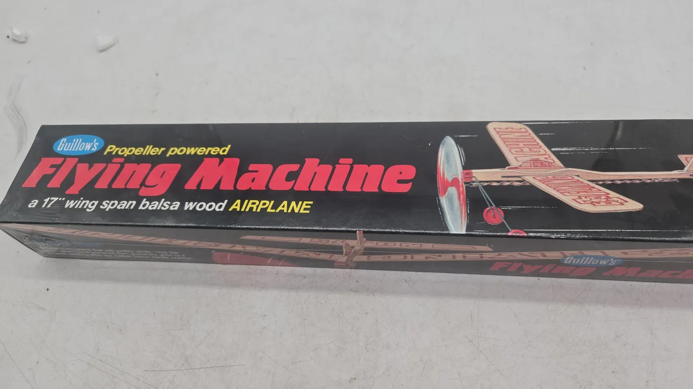 Vintage guillows propeller powered flying airplane, new in box