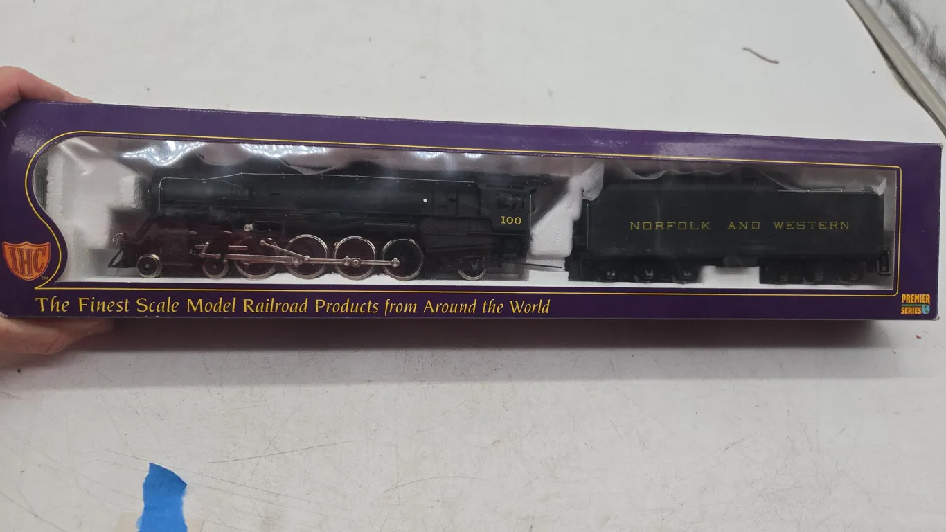 Vintage IHC premier series North fork and Western number 100 HO scale steam engine locomotive and te